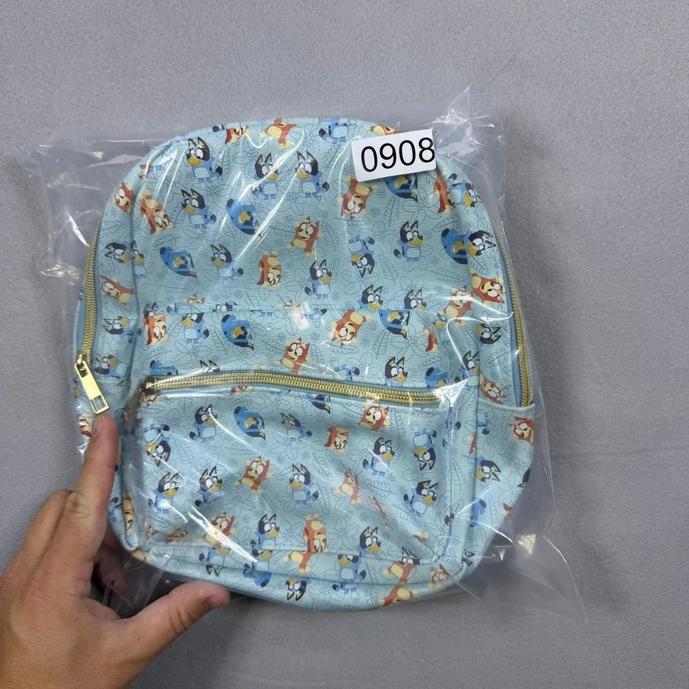 Bluey and Bingo All Over Print Mini Backpack Light Blue Gold Zipper Pocket